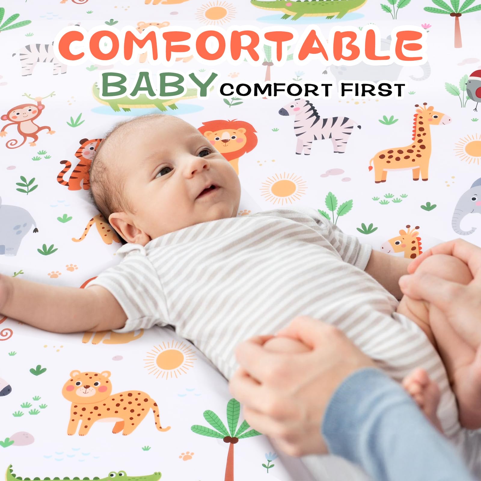 Cloele jungle animal playyard sheet adds playful nursery decor.