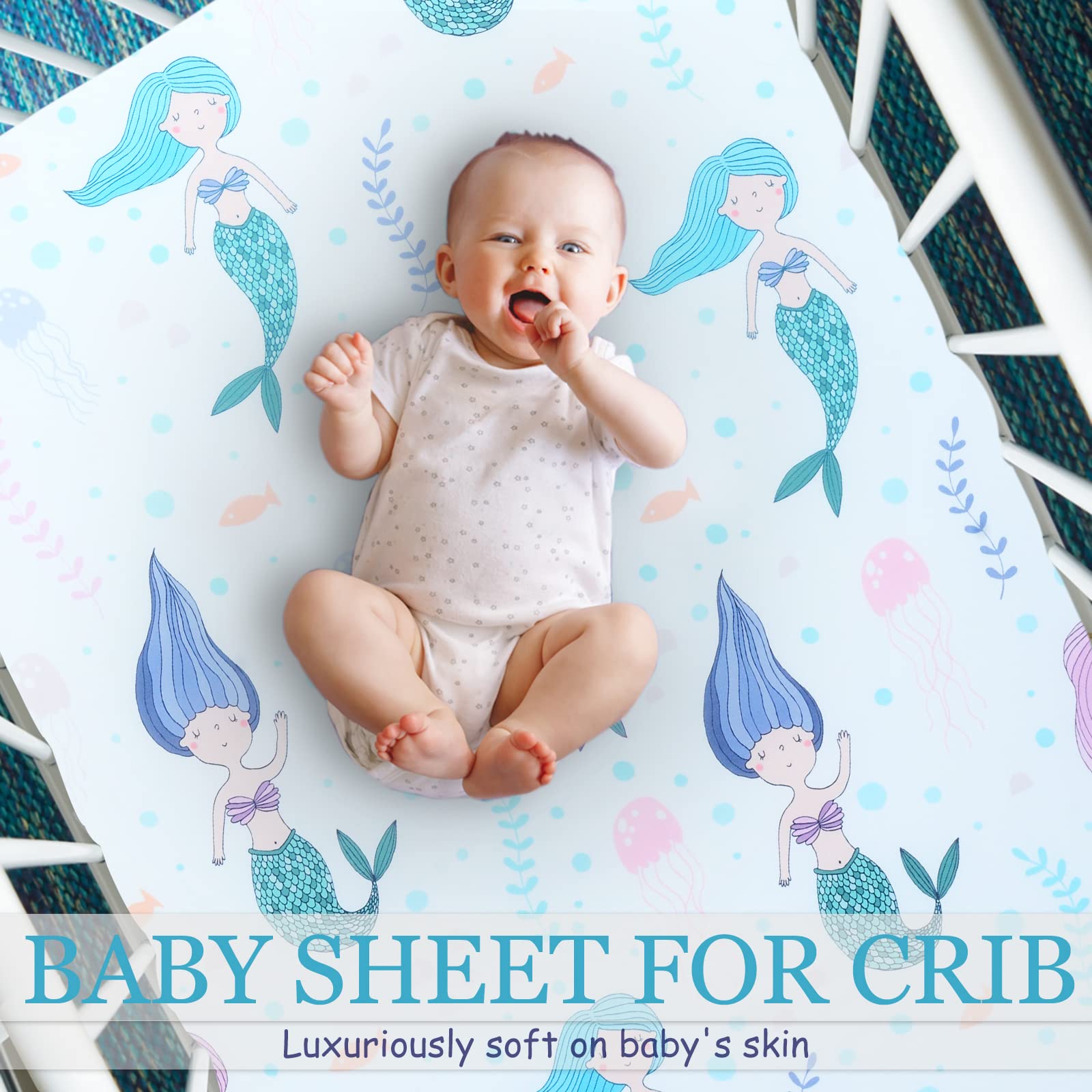 Cloele Mermaids crib sheet folded and ready for nursery storage.
