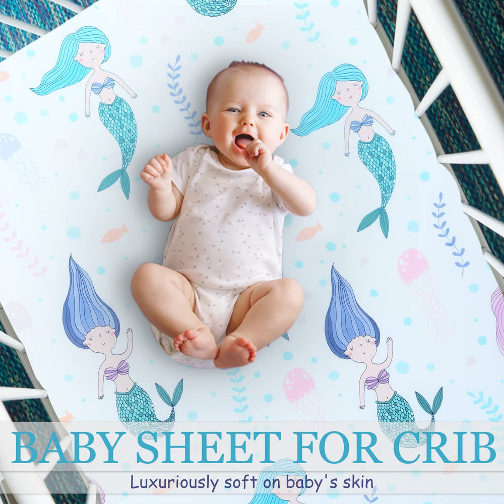Cloele Mermaids crib sheet folded and ready for nursery storage.