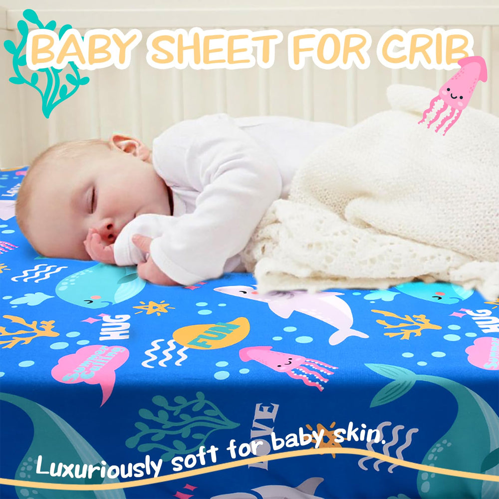 Cloele Ocean whale-pattern crib sheet fits standard crib mattresses securely.