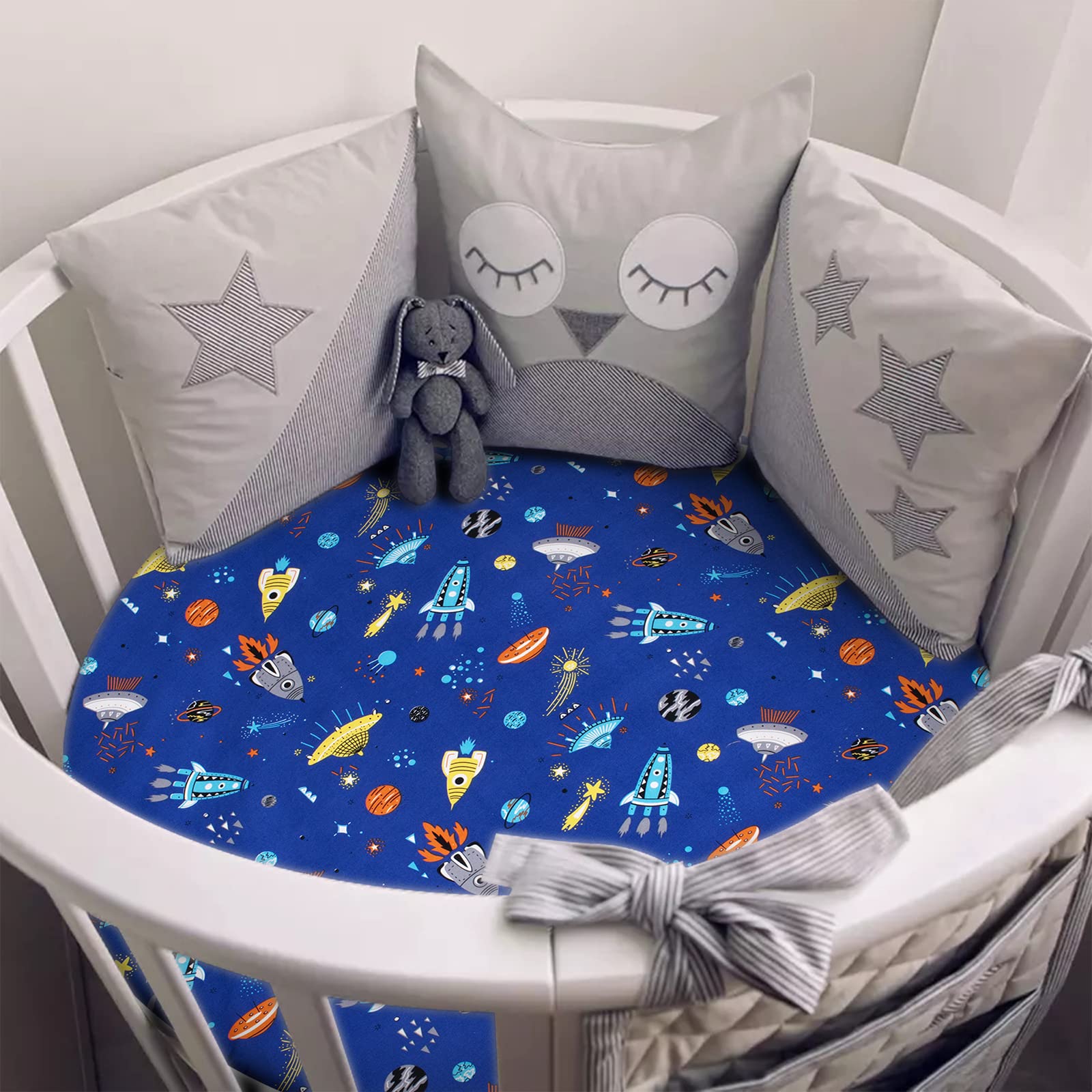 Cloele color-fast fabric maintains vibrant prints on the round crib sheet.