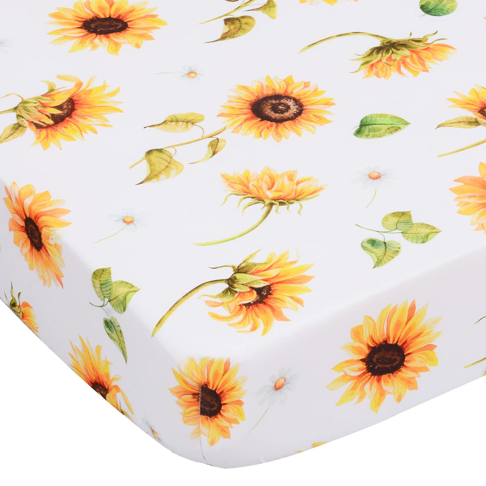 Cloele Sunflower crib sheet on standard crib mattress with secure fit