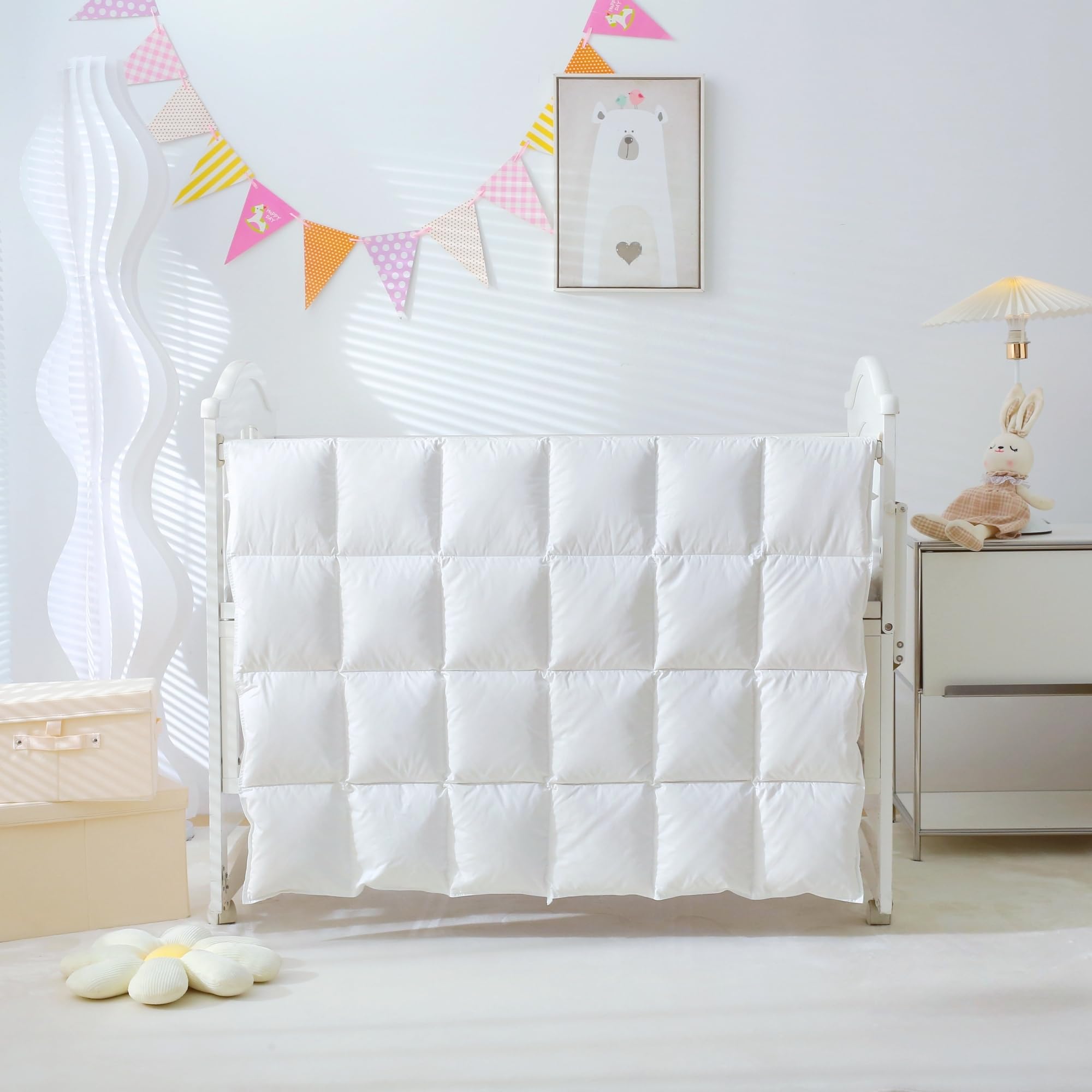 CLoucl baby crib comforter shows cloud-soft shell for gentle all-season warmth in nursery