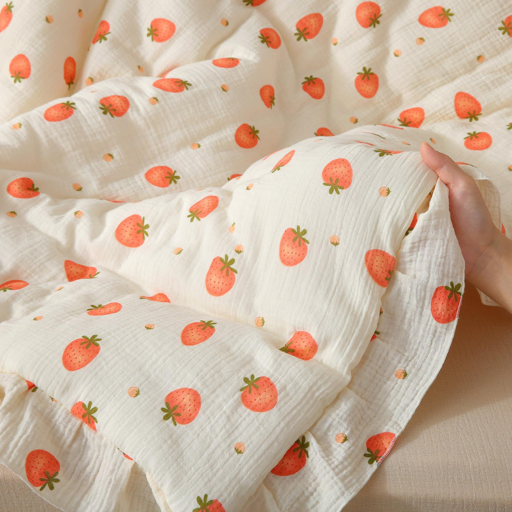 CLoucl muslin blanket in stroller ready for on-the-go comfort