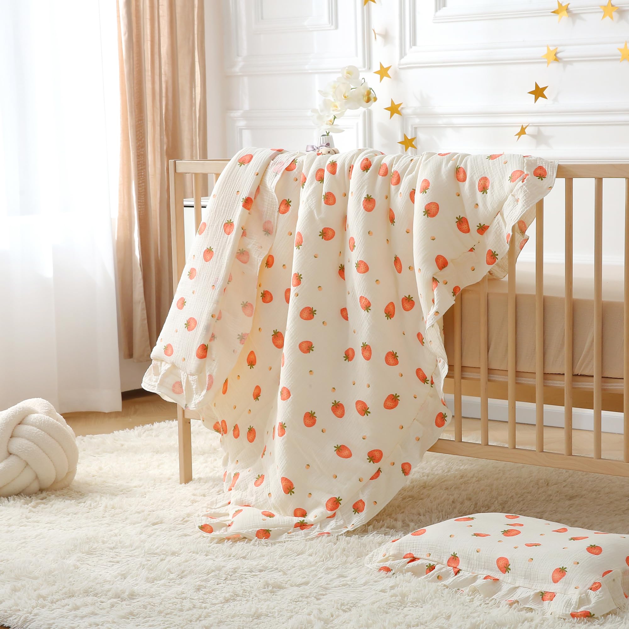 CLoucl muslin crib comforter 33x43 inches in use in a cozy crib