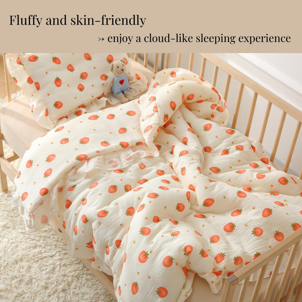 CLoucl muslin crib comforter 41x48 inches laid out for toddler-sized warmth