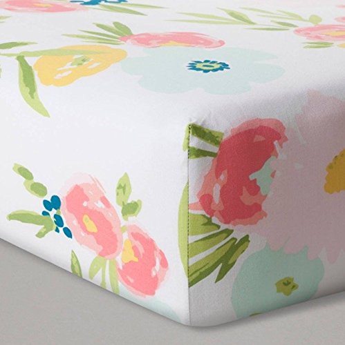 Cloud Island cotton fitted crib sheet with pink floral watercolor pattern, snug fit for standard crib mattresses.
