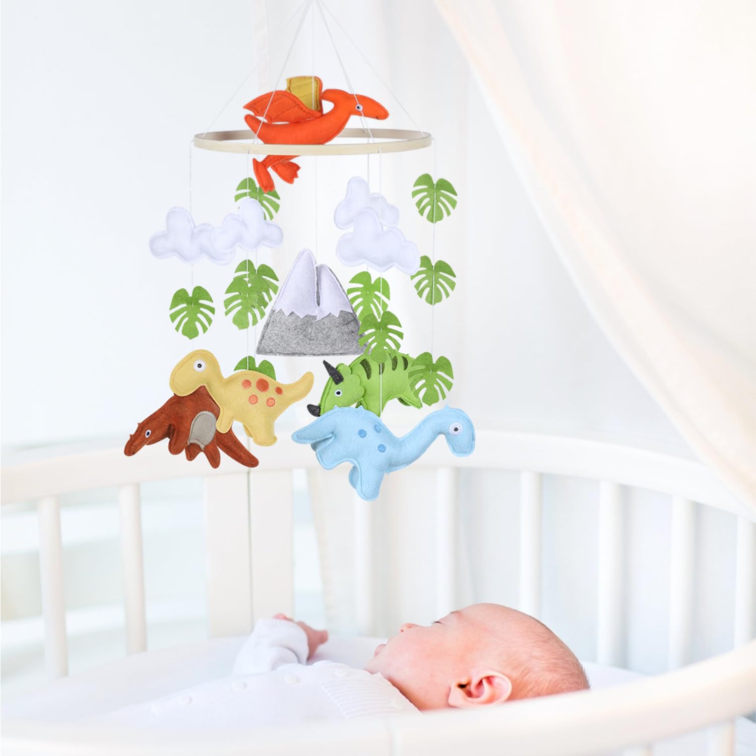 CLYMENE gender-neutral dinosaur decor suits any nursery theme.