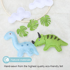 CLYMENE handcrafted dinosaur mobile with felt dinos adds soft texture and tactile interest.