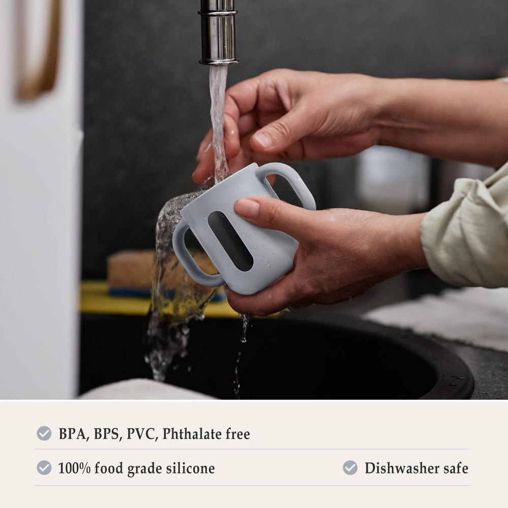 CLYMENE silicone cup with easy-grip handles for tiny hands.