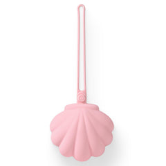 CLYMENE Blossom silicone pacifier holder with seashell silhouette for neat storage.