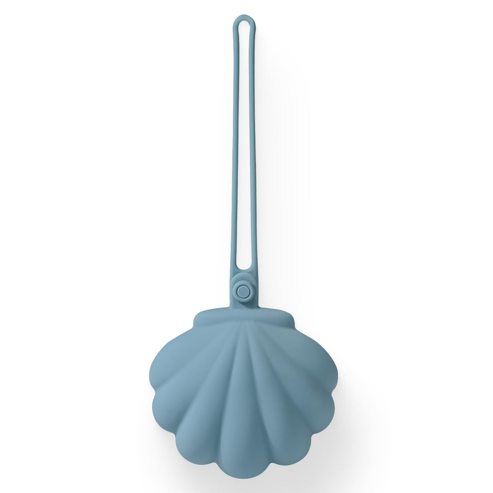 CLYMENE pacifier holder case with seashell silhouette keeps pacifiers organized on the go.