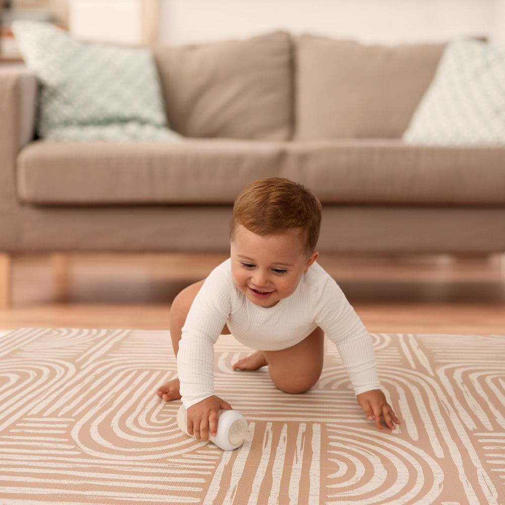 Co-Toddlery water-resistant surface keeps spills easy to wipe away.