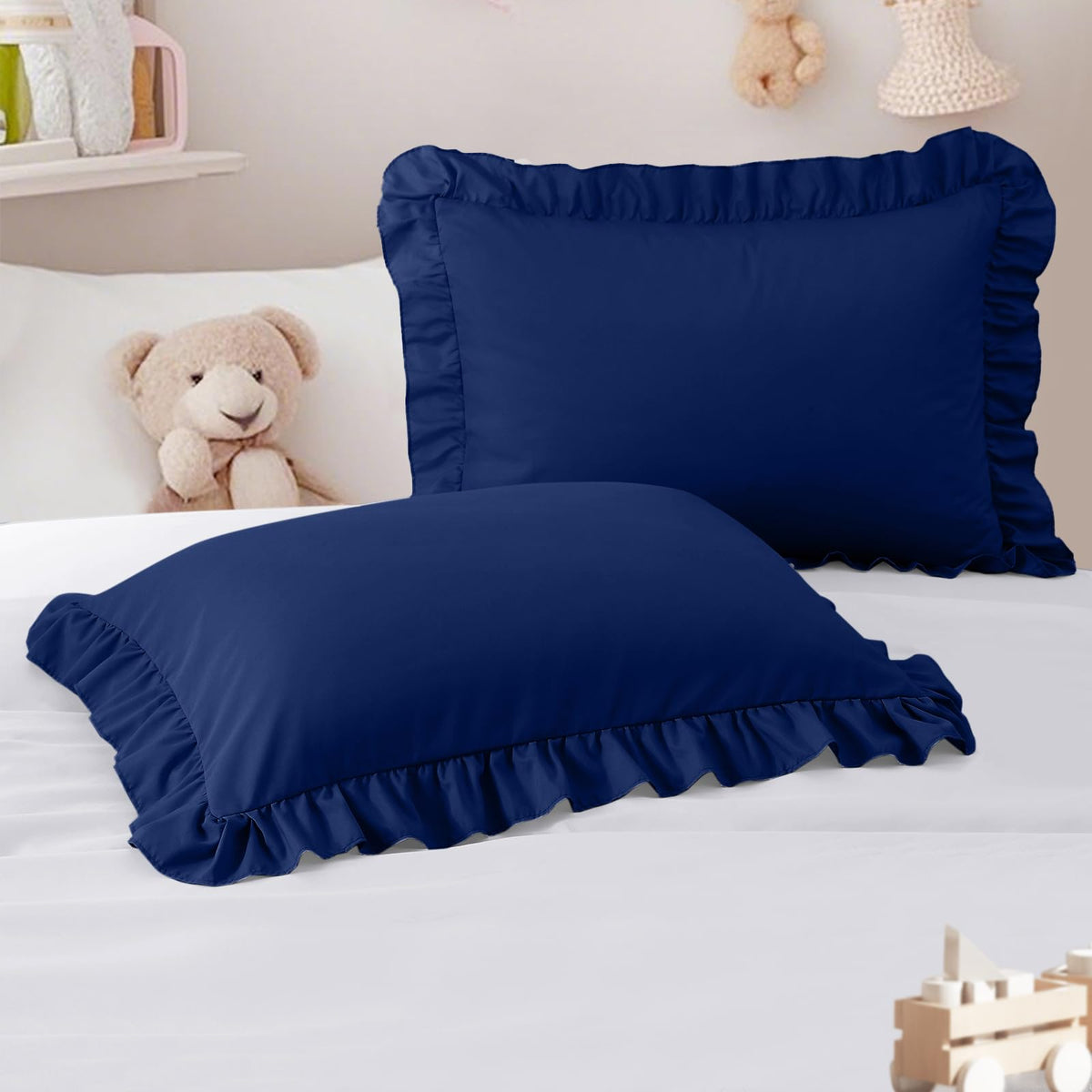 Cobedzy navy ruffle edge pillowcase provides soft toddler comfort.