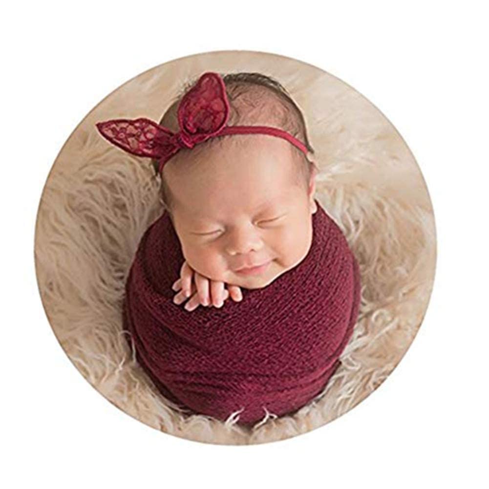 Coberllus newborn wrap red sideview highlights drape for flattering portrait sessions.