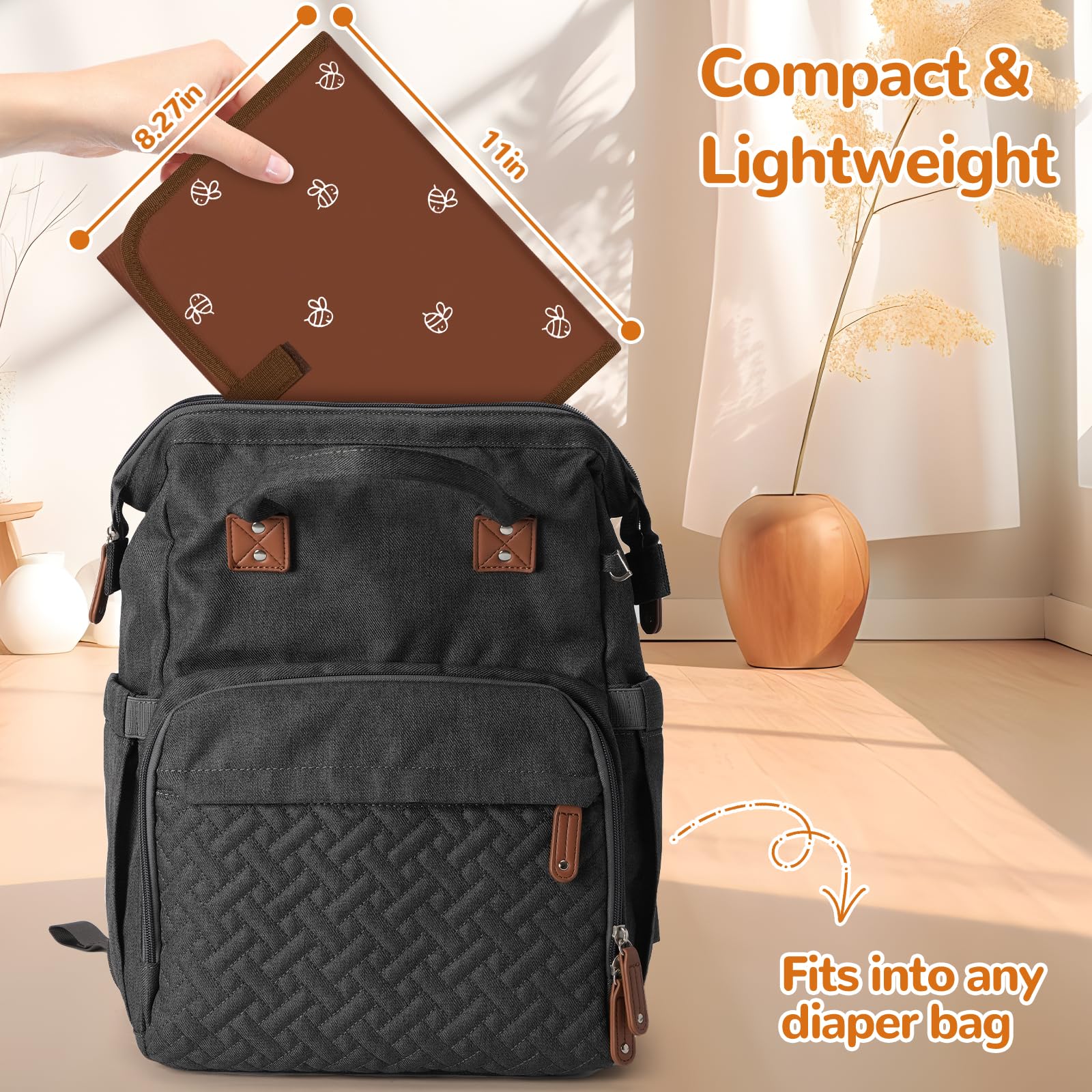 Coinarin portable diaper-changing-pad brown-bee closed for compact storage in a diaper bag.