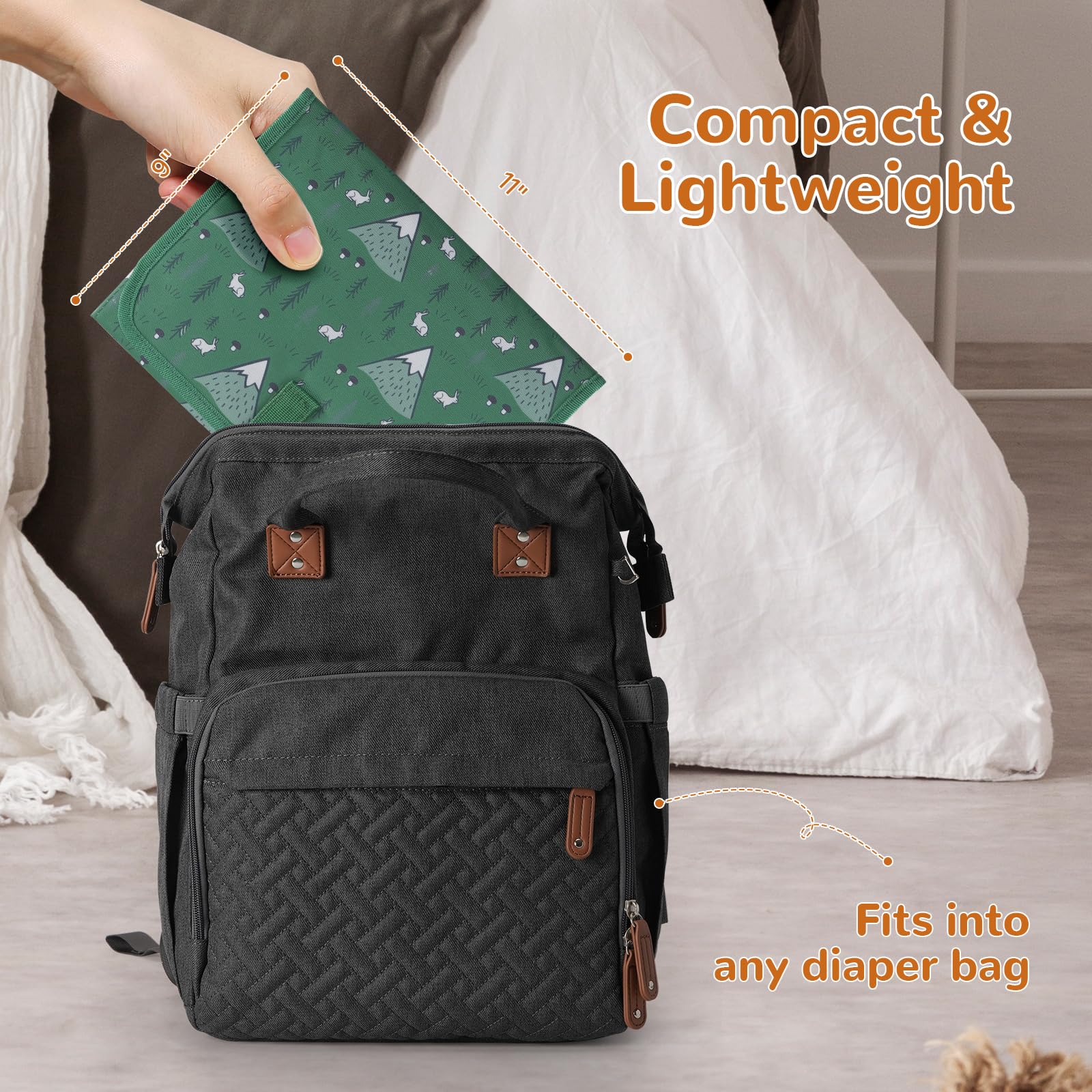 Coinarin portable changing pad open to reveal spacious, soft changing surface.
