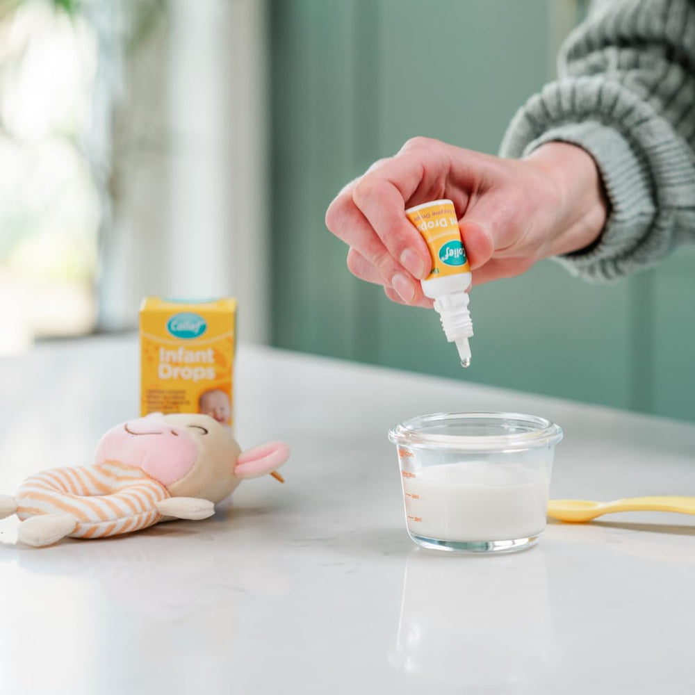 Colief baby-drinking-bottle demonstrates use during feeds.