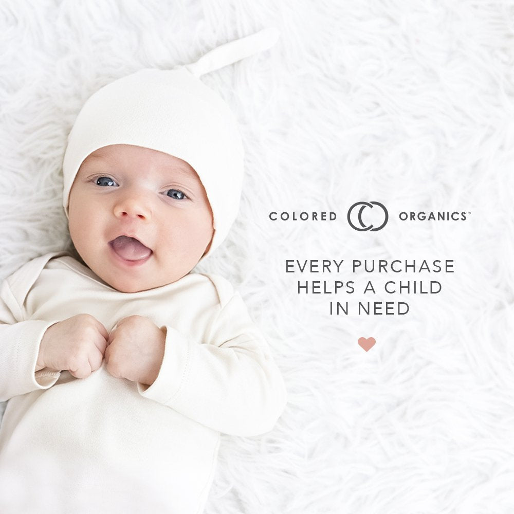 Colored Organics stylish headband completes cute baby outfits.