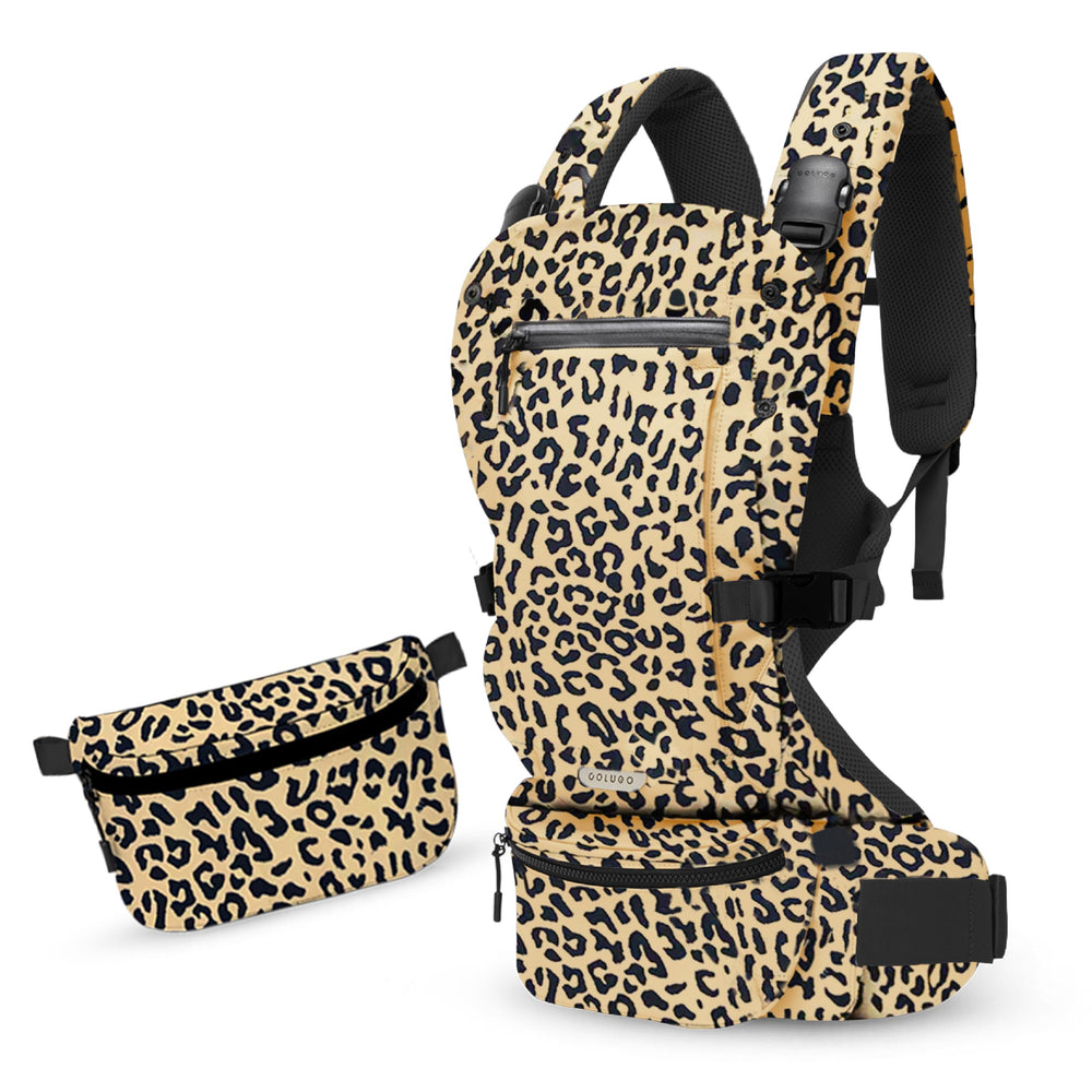 Colugo baby carrier in inward carry for ergonomic support for baby and parent.