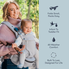 Colugo olive carrier, inward carry mode with newborn-style positioning.