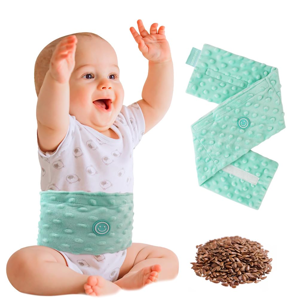 Comfheat flaxseed pack inside heated tummy wrap for gentle infant comfort.