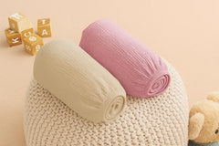 Two-pack layout of Comforista bassinet sheets ready for quick changes.
