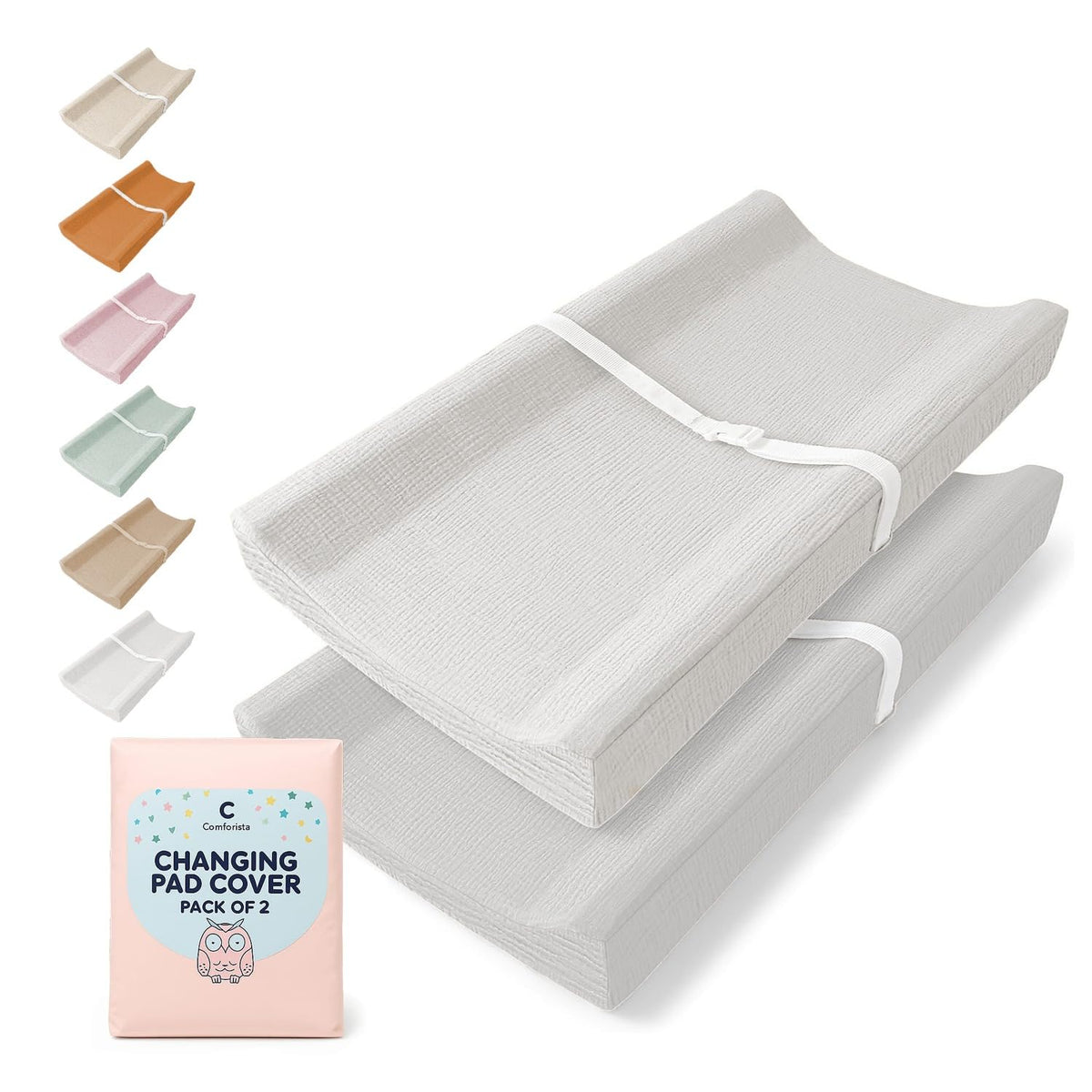 Comforista Muslin Changing Pad Cover 2-Pack on a changing table for soft, breathable protection.