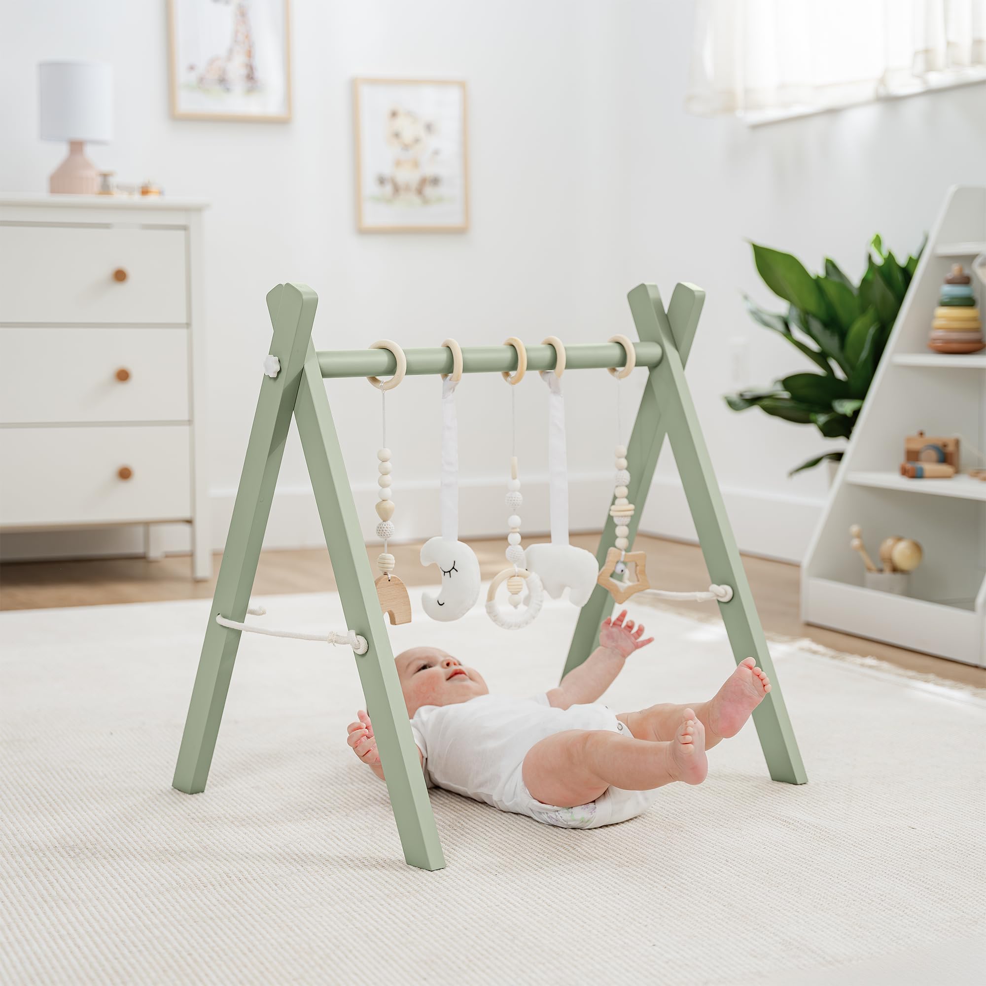 Five sensory hanging toys from Comfy Cubs stimulate visual and tactile exploration.