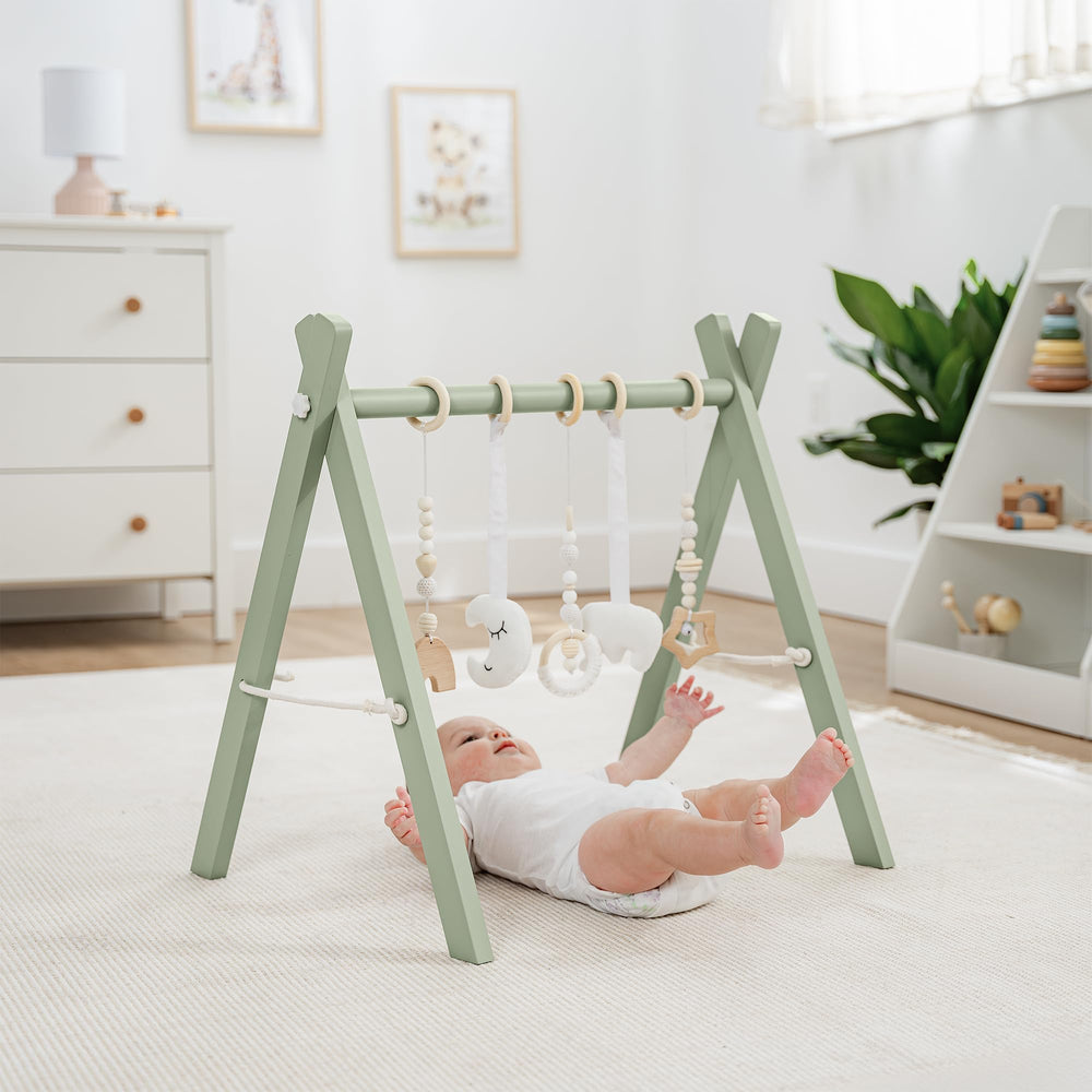 Five sensory hanging toys from Comfy Cubs stimulate visual and tactile exploration.