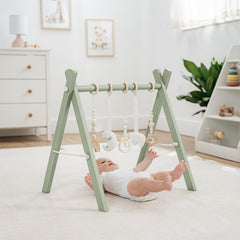 Five sensory hanging toys from Comfy Cubs stimulate visual and tactile exploration.