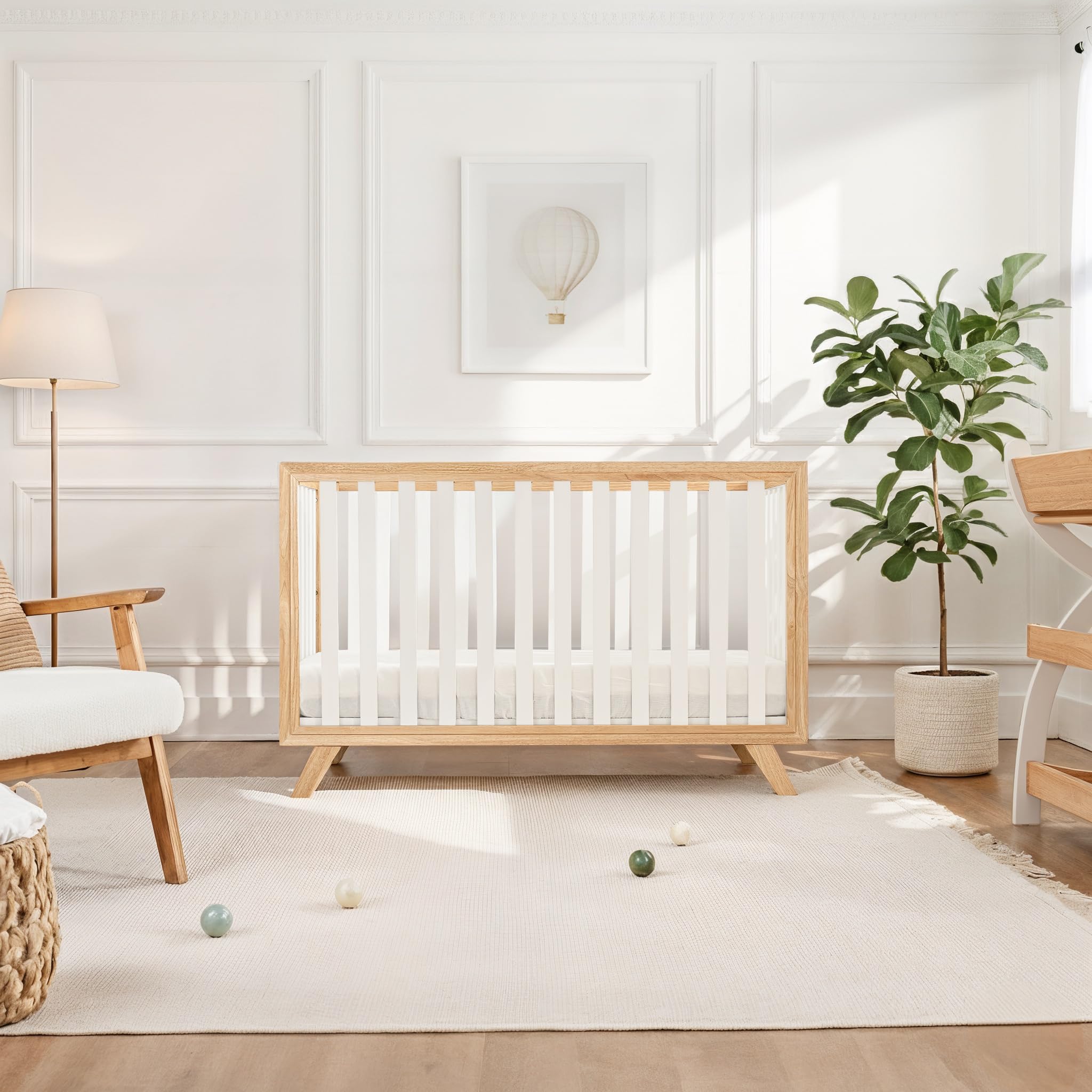 Adjustable mattress height feature on the Comfy Cubs crib for growing baby