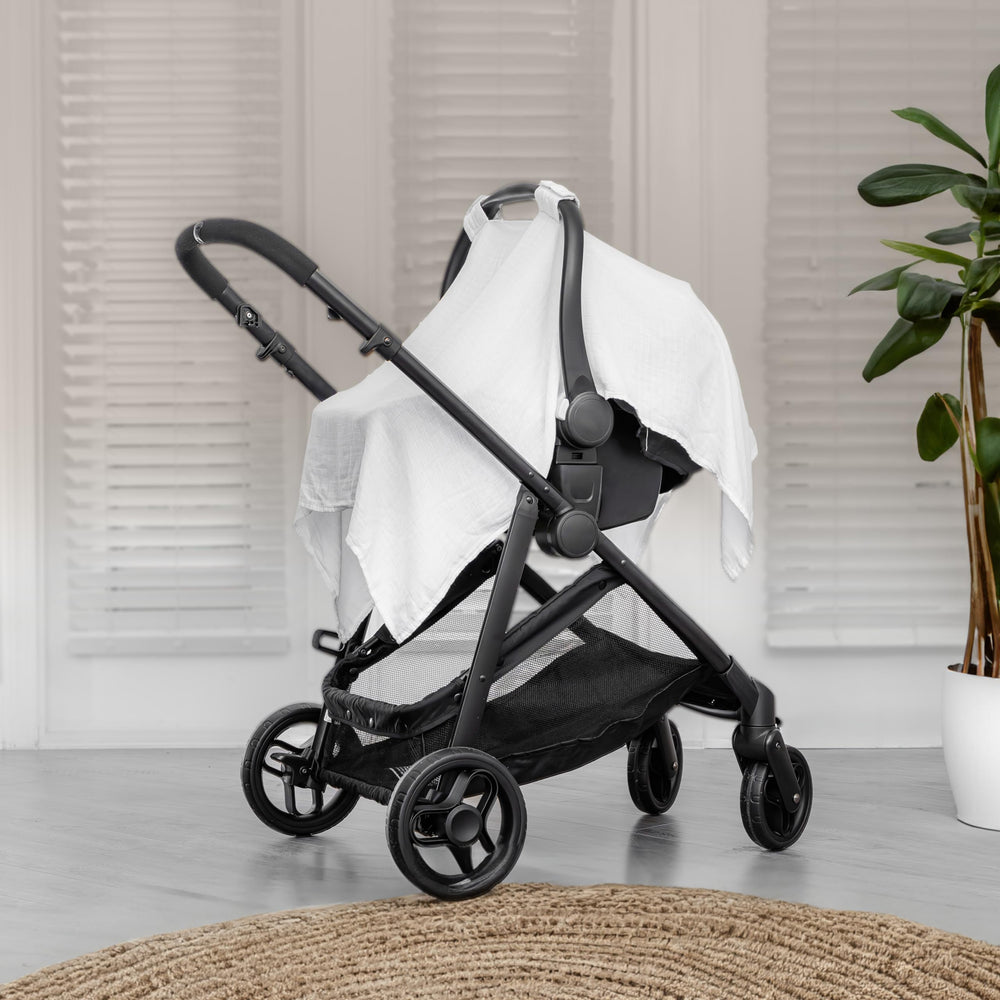 Comfy Cubs car seat cover full canopy demonstrates sun and bug protection.