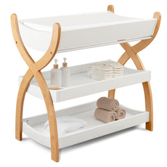 Comfy Cubs changing table shows sturdy wood construction for durable diaper changes.