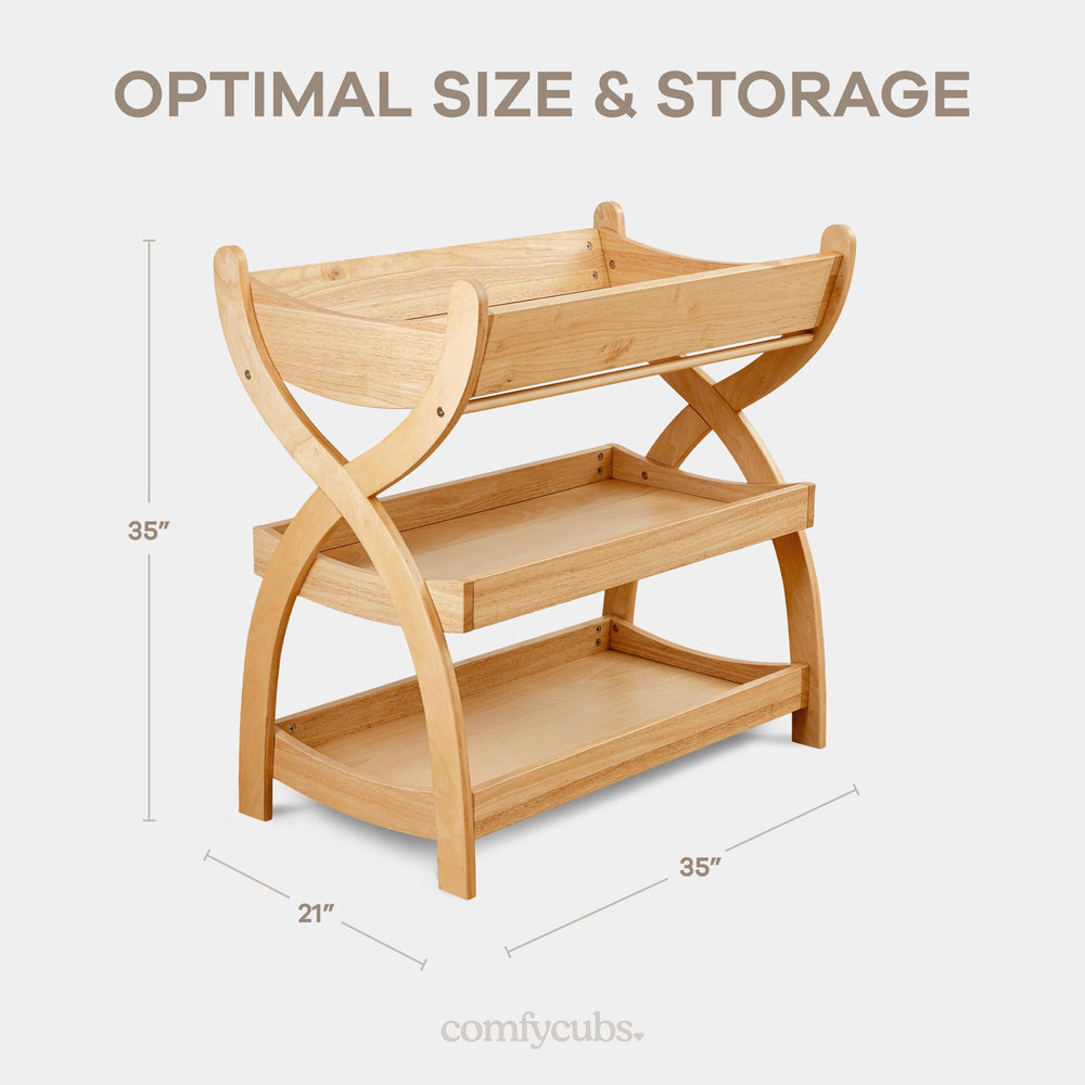 Comfy Cubs natural wood changing table blends with cribs and furniture.