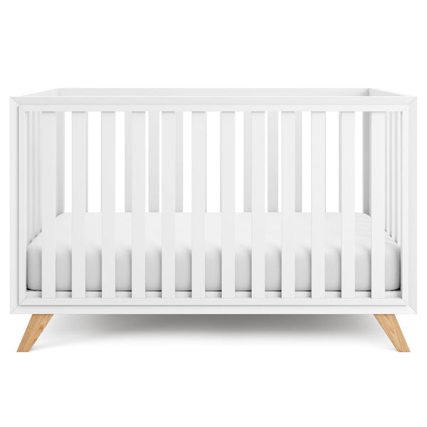 Comfy Cubs baby crib with adjustable-height feature for growing babies.
