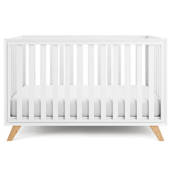 Comfy Cubs baby crib with adjustable-height feature for growing babies.