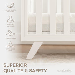 Convertible Comfy Cubs crib with toddler bed kit