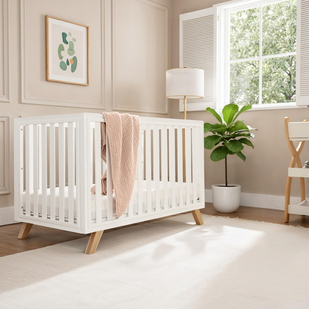 Comfy Cubs solid wood crib emphasizes durable, safe construction.