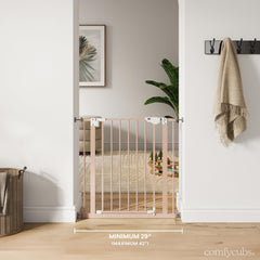Comfy Cubs gate on stairs blocks access for curious kids and pets.