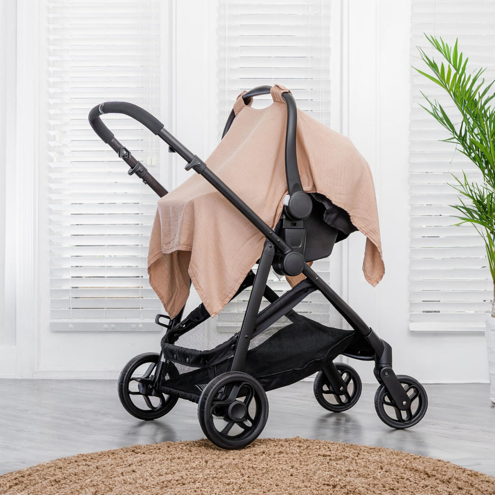 Comfy Cubs canopy fabric in muslin blend provides sun and bug protection on stroller trips.
