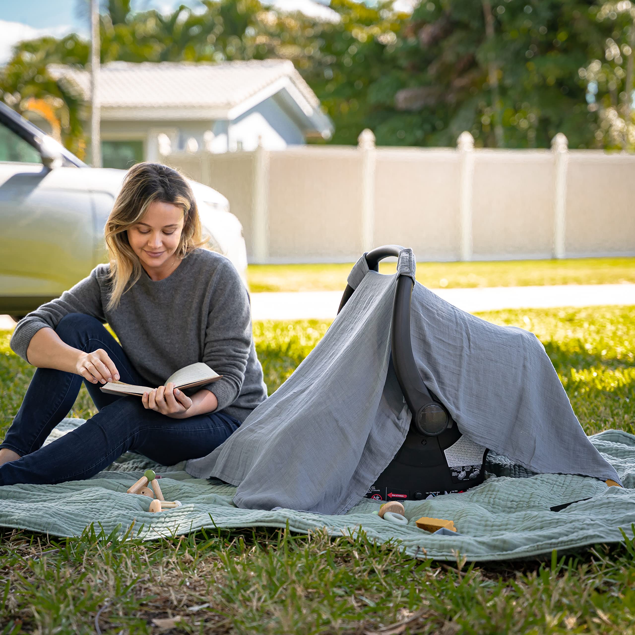 Comfy Cubs canopy demonstrating universal-fit design over a standard car seat.