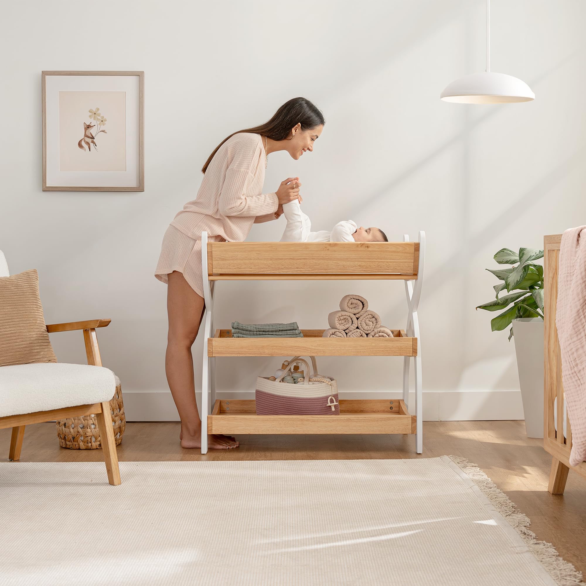 Comfy Cubs changing table with shelves keeps diapers and wipes within reach