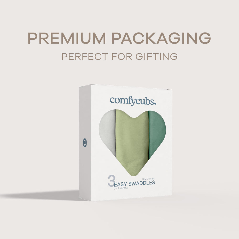 Comfy Cubs Easy Swaddle Azul in use displays snug wrap and gentle warmth for infants.