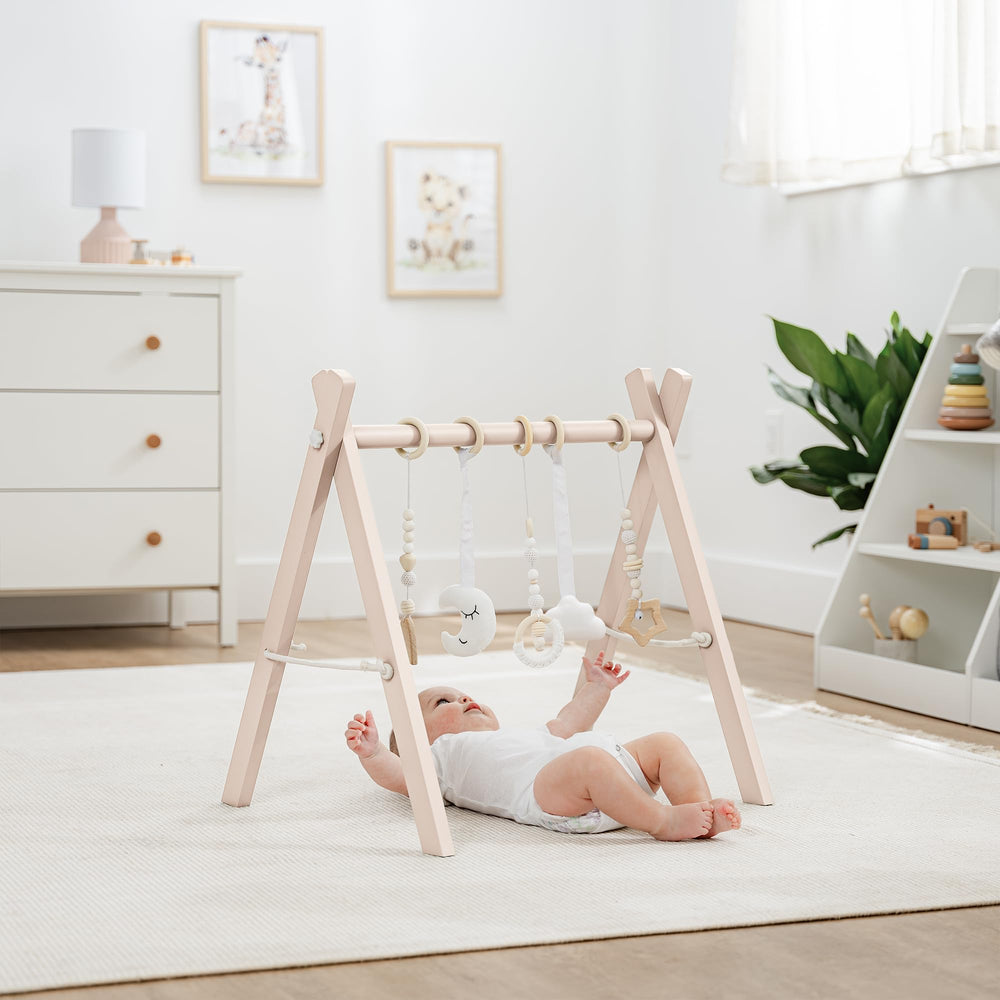 Five hanging toys stimulate visual tracking and tactile discovery for babies.