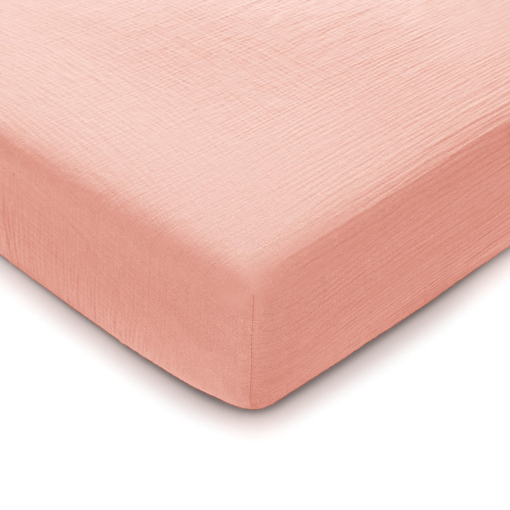 Comfy Cubs Lace Pink Muslin crib sheet flatlay shows soft breathable fabric.
