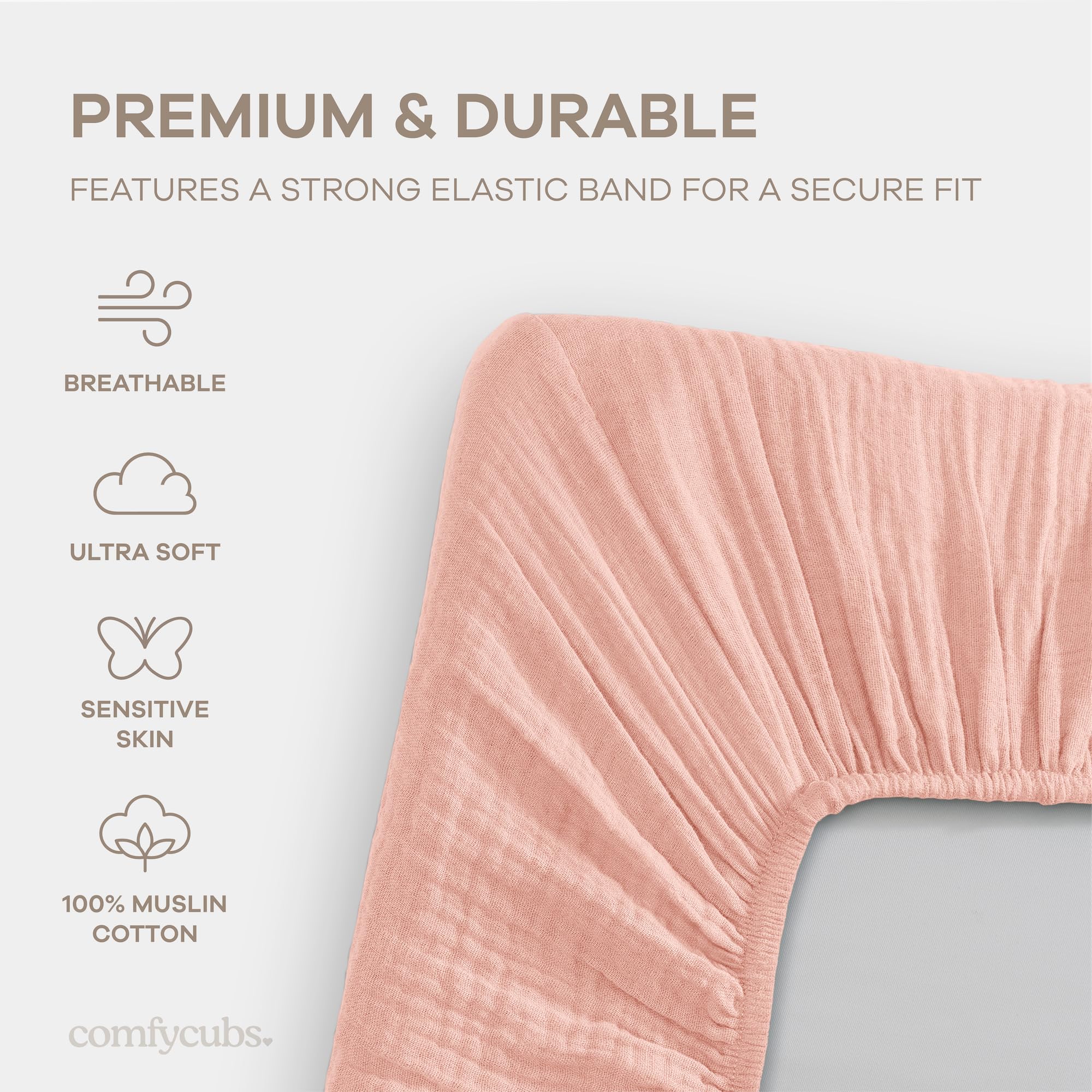 Comfy Cubs muslin bassinet sheet lace pink elastic edge—secure fit demonstration.