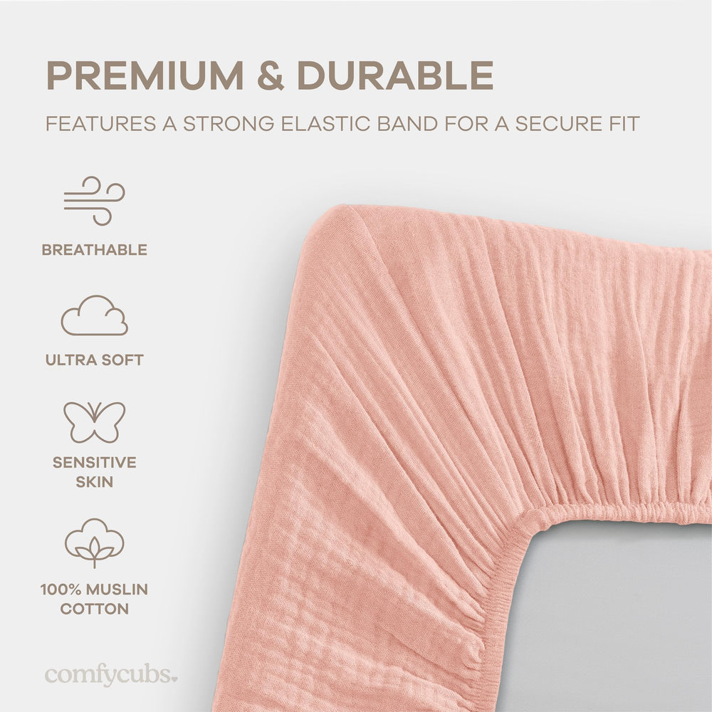 Comfy Cubs muslin bassinet sheet lace pink elastic edge—secure fit demonstration.