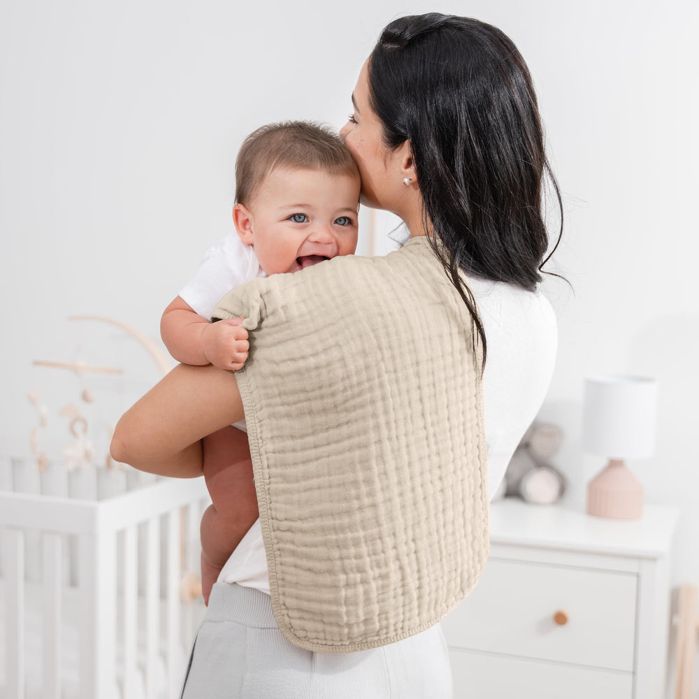Comfy Cubs muslin burp cloth 6-layer absorbency helps tame spills gently.