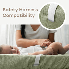 Comfy Cubs pad cover with openings for safety straps during diaper changes.